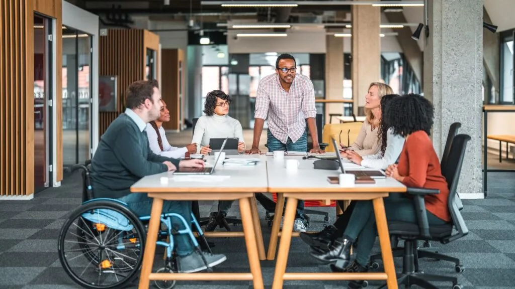 Professional digital marketing team collaborating on client strategies